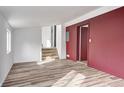 Bright basement with LVP flooring and access to upper levels at 940 W 53Rd St, Indianapolis, IN 46208
