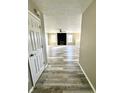 Bright entryway with wood-look floors, leading to living area at 123 S Morris Blvd, Bargersville, IN 46106