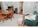 Cozy living room featuring an area rug and a decorative accent chair at 1719 Fletcher Ave, Indianapolis, IN 46203