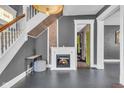 Living room features a fireplace and hardwood floors at 3816 Rookwood Ave, Indianapolis, IN 46208