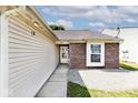 Brick and siding exterior with walkway leading to front entrance at 6438 Emerald Springs Dr, Indianapolis, IN 46221