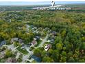 Neighborhood view showcasing home's location near Eagle Creek Reservoir at 7812 Preservation Dr, Indianapolis, IN 46278