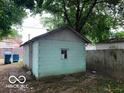 Small detached garage in the backyard at 1035 S Tremont St, Indianapolis, IN 46221
