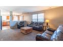 Living room with leather furniture and wooden coffee table at 202 Oakview Dr, Mooresville, IN 46158