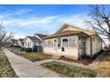 Inviting home with a sunroom, set along a quiet street and walkway at 1028 Albany St, Indianapolis, IN 46203