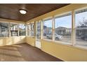 Bright and airy sunroom with multiple windows offering neighborhood views and great light at 1028 Albany St, Indianapolis, IN 46203