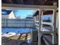 Wooden deck overlooking a fenced backyard at 431 N 18Th Ave, Beech Grove, IN 46107