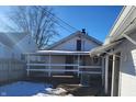 Spacious backyard with deck and snow-covered ground at 431 N 18Th Ave, Beech Grove, IN 46107