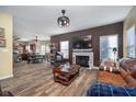 Open concept living room with kitchen views and hardwood floors at 7541 Mather Ln, Indianapolis, IN 46239