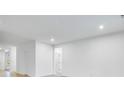 Bright living room featuring neutral walls and floors, providing a blank canvas for customization and ample natural light at 1020 Stonehaven Dr, Indianapolis, IN 46239
