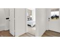 Modern bathroom with a shower and access to a bedroom and hallway at 2112 Boxwood Dr, Greenfield, IN 46140