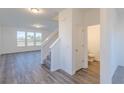 Foyer with stairs and half bathroom at 902 Stonehaven Dr, Indianapolis, IN 46239