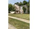 Two-story house with beige siding, red shutters, and a spacious lawn at 10391 Butler Dr, Brownsburg, IN 46112