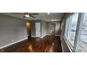 Spacious living room with dark hardwood floors and neutral walls at 11 Eastridge Dr, Greenwood, IN 46143