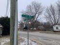 Street sign marking the location of the property at 12625 Strawtown Ave, Noblesville, IN 46060