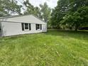 Large backyard with lush green grass at 2533 Aurie Dr, Indianapolis, IN 46219