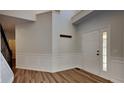 Bright entryway with wood floors and white door at 5131 Nicodemus Dr, Plainfield, IN 46168