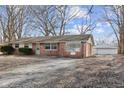 Brick ranch house with attached garage at 6847 W 15Th St, Indianapolis, IN 46214