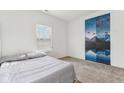 Bright bedroom with a bed, window blinds, and a mountain mural at 1075 Galaxy Ln, Danville, IN 46122