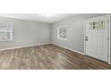 Bright living room featuring hardwood floors and neutral walls at 4048 Breton St, Indianapolis, IN 46222