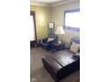 Relaxing living room with leather seating and a chaise lounge at 917 E 34Th St, Indianapolis, IN 46205