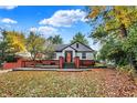 Charming home with a well-maintained lawn and landscaping, perfect for outdoor enjoyment at 233 W Westfield Blvd, Indianapolis, IN 46208