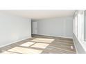 Bright living room with hardwood floors and neutral walls at 4102 Barnor Dr, Indianapolis, IN 46226