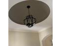 Modern orb chandelier adds elegance to the room with its striking design at 2212 Galleone Way, Plainfield, IN 46168