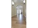 Light and airy entryway with wood-look floors at 2212 Galleone Way, Plainfield, IN 46168