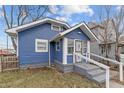 Blue house with front porch and steps at 2814 Brookside Ave, Indianapolis, IN 46218