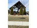 Community gazebo with benches and evergreen trees at 19438 Astoria Ave, Sheridan, IN 46069