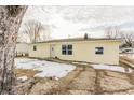 Newly renovated ranch home with snow on the ground at 195 E Center Dr, Mooresville, IN 46158