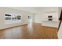 Living room with hardwood floors and sliding doors to backyard at 19723 Atwater Ave, Sheridan, IN 46069