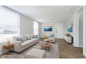 Inviting living room with neutral-toned furniture, bright windows, and stylish decor for a comfortable ambiance at 3102 N Arsenal Ave, Indianapolis, IN 46218