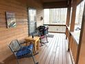 Cozy porch with comfortable seating, perfect for relaxing outdoors with a serene view at 4104 W Fox Trl, Trafalgar, IN 46181