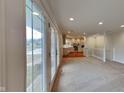 Open floor plan connecting living room and kitchen at 5939 Brendonridge S Ct, Indianapolis, IN 46226