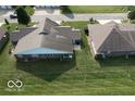 An aerial view of the rear of the property with well-maintained lawn at 11835 Civic Cir, Mooresville, IN 46158