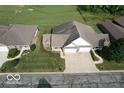 Overhead aerial view of the property, featuring two units with attached garages and driveways at 11835 Civic Cir, Mooresville, IN 46158
