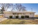 Charming single story home with a stone facade and an attached one-car garage, complemented by a well-maintained front yard at 1505 E 1000 N, Pendleton, IN 46064