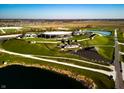 Aerial view of concert venue with outdoor stage and landscaping at 15135 Covebrook Ln, Fishers, IN 46037