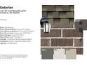 Close up showing the brick, shingles and exterior light fixture of the home at 15135 Covebrook Ln, Fishers, IN 46037