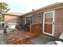 Small wooden deck and brick patio at 3301 Timberbrook Ct, Danville, IN 46122