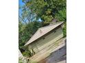 Attached garage with light green door at 3611 N Sherman Dr, Indianapolis, IN 46218