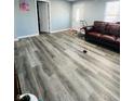 Spacious living room featuring wood-look floors at 1243 W 19Th St, Indianapolis, IN 46202