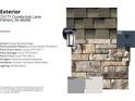 Exterior features include stone accents, weathered shingles, and stylish black hardware and lighting at 15171 Covebrook Ln, Fishers, IN 46037