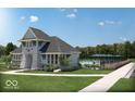 Community pool and clubhouse with a walkway at 6153 Wainscott Trce, McCordsville, IN 46055
