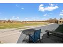 Spacious backyard with patio furniture and open space at 7710 Silver Moon Way, Indianapolis, IN 46259