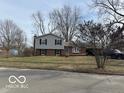 Ranch home with a large front yard and mature trees at 1519 Mary Dr, Lebanon, IN 46052