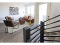 Stylish living room featuring a brown velvet couch and two armchairs at 1523 Marlowe Ave, Indianapolis, IN 46201