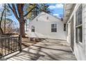 Spacious deck with black railings overlooking a tree-filled backyard at 1866 W 57Th St, Indianapolis, IN 46228